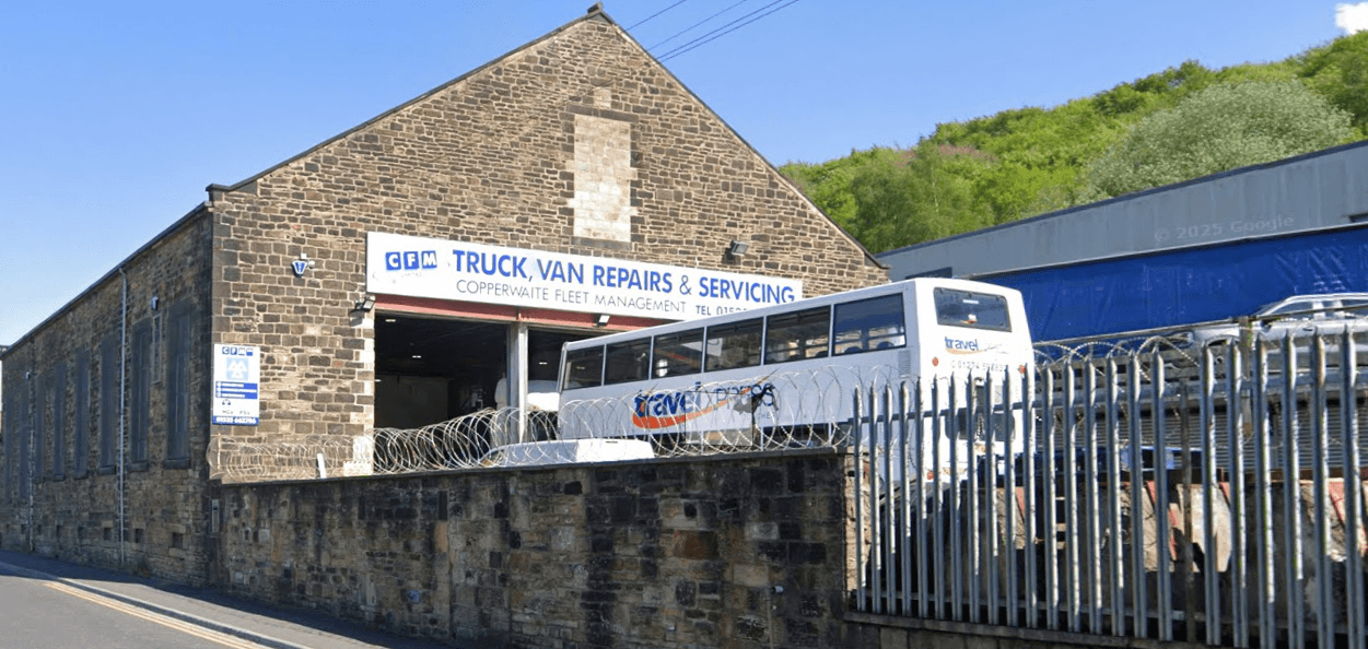 CFM technicians working on commercial fleet vehicles
